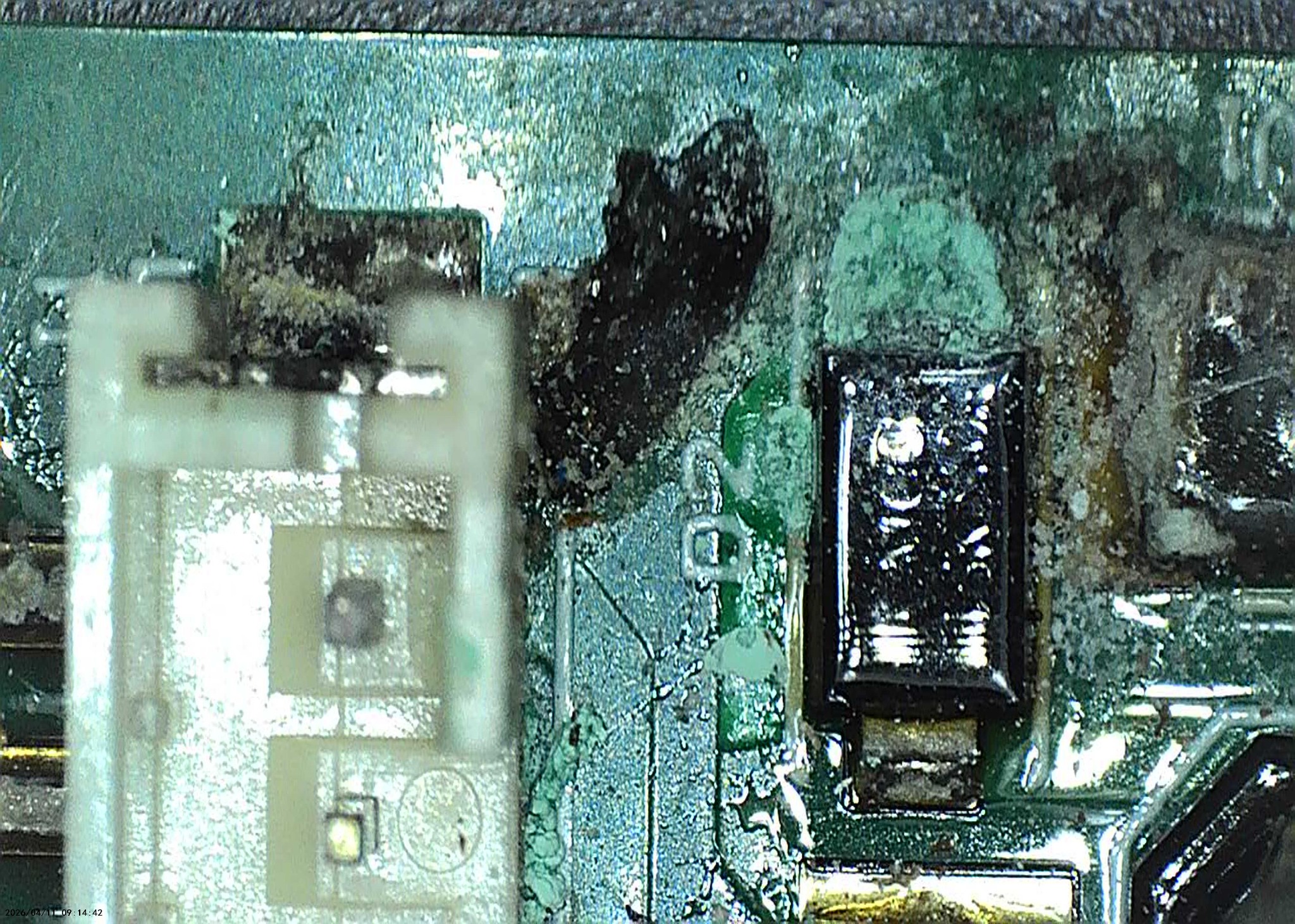Microscope view of small components and connections on the PPC820 control board