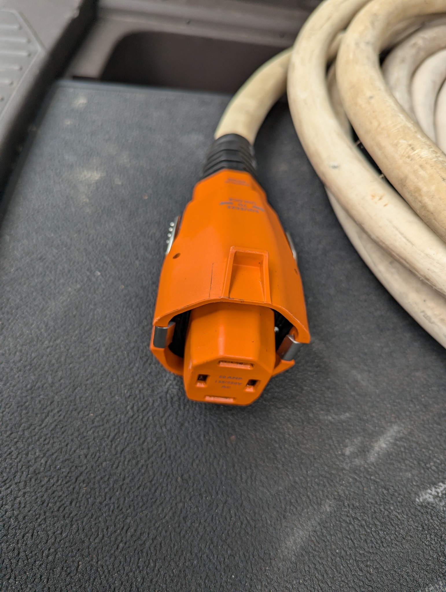 Orange SmartPlug BF50 connector assembled on the existing thick shore-power cord